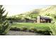 Lush community park featuring a tennis court, covered pavilion, and ample green space for recreation at 2021 Grayside Cir, Castle Rock, CO 80109