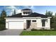 Charming single-Gathering home with light siding, a garage and inviting front yard at 2021 Grayside Cir, Castle Rock, CO 80109