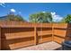 Private backyard with stone patio and wood fence at 1211 W 112Th Ave # B, Denver, CO 80234