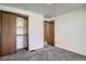 Spacious bedroom with closet, new carpet and neutral paint at 1211 W 112Th Ave # B, Denver, CO 80234