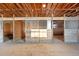 Spacious barn interior with wooden stalls and ample natural light, perfect for equestrian enthusiasts at 8530 W Jefferson Ave, Denver, CO 80235