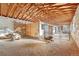 Rustic barn interior with exposed wood beams and cinder block walls at 8530 W Jefferson Ave, Denver, CO 80235