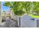 Cozy patio area featuring a wrought iron table and chairs, and a gated entrance at 5750 W Atlantic Pl, Lakewood, CO 80227