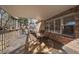 Covered patio with an outdoor dining set on a rug, perfect for enjoying the outdoors at 6251 S Iola Ct, Englewood, CO 80111