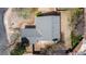 Aerial view showcasing the layout, roof, and surrounding landscape of the property at 15875 E Custer Dr, Aurora, CO 80017