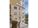 Balcony with outdoor seating and barbecue grill, offering city and mountain views at 5455 Landmark Pl # 1009, Greenwood Village, CO 80111