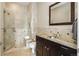 Elegant bathroom with walk-in shower, granite countertop, and modern fixtures at 5455 Landmark Pl # 1009, Greenwood Village, CO 80111