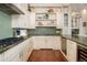 Spacious kitchen with a stainless steel appliance package, a gas cooktop, and granite countertops at 5455 Landmark Pl # 1009, Greenwood Village, CO 80111