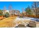 Spacious backyard with a play set and seating area, perfect for outdoor activities and relaxation at 3644 Sunchase Dr, Castle Rock, CO 80109