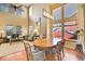 Open dining room with lots of natural light, seamlessly connecting to the living space at 3644 Sunchase Dr, Castle Rock, CO 80109