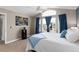 Bedroom with vaulted ceiling and neutral carpet and large windows overlooking neighborhood at 19634 E Clear Creek Trl, Parker, CO 80134