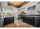 Updated kitchen featuring granite countertops and views of the breakfast nook at 1572 W Long Ave, Littleton, CO 80120