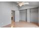 Bright bedroom with ceiling fan, vaulted ceiling and walk-in closet provides a comfortable retreat at 1128 S Ventura Cir # H, Aurora, CO 80017