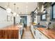 Bright, spacious kitchen with wood countertops, stainless steel appliances, and a large central island at 2939 Osceola St, Denver, CO 80212