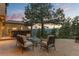 Exterior patio with bar and seating provides amazing views of the mountains at sunset at 2063 Montane E Dr, Golden, CO 80401