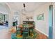 Dining area with light fixture and an archway to the rest of the home at 879 Quintana Ln, Erie, CO 80516