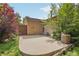 Private backyard features a concrete patio and garden with a wooden fence, perfect for outdoor enjoyment at 2173 S Ouray St, Aurora, CO 80013