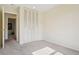 Clean bedroom with closet and neutral carpet, offering versatile living space and storage at 2173 S Ouray St, Aurora, CO 80013