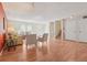 Bright living room featuring hardwood floors, neutral paint, and contemporary furniture creating an inviting atmosphere at 2173 S Ouray St, Aurora, CO 80013