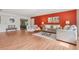 Open living room featuring wood floors, neutral paint, and contemporary furniture creating an inviting atmosphere at 2173 S Ouray St, Aurora, CO 80013