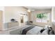 Serene bedroom boasts a ceiling fan, ample natural light, and a sliding barn door to the bathroom at 2225 S Lima Ct, Aurora, CO 80014