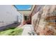 Inviting covered front porch with brick accents and a well-maintained walkway leading to the entrance at 2225 S Lima Ct, Aurora, CO 80014