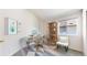 Bright home office showcasing contemporary decor, neutral paint, and a window providing natural light at 2225 S Lima Ct, Aurora, CO 80014