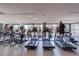 Well-equipped fitness center with modern treadmills, exercise equipment, and city views at 4200 W 17Th Ave # 411, Denver, CO 80204