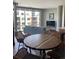 Cozy living area with dining space, comfortable sofa, and large windows with city views at 4200 W 17Th Ave # 411, Denver, CO 80204