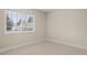 Clean bedroom with a window and neutral paint at 5708 S Galena St, Greenwood Village, CO 80111