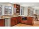 Traditional kitchen with granite countertops, stainless steel appliances, and ample natural light from the large window at 5708 S Galena St, Greenwood Village, CO 80111