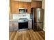 The kitchen showcases stainless steel appliances, granite countertops, and ample cabinet space at 1435 N Uinta St, Denver, CO 80220