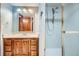 Bathroom features wood vanity and shower stall at 1737 Jules Ct, Highlands Ranch, CO 80126