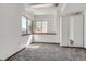 Cozy bedroom featuring plush carpet, bright natural light, and closet at 1737 Jules Ct, Highlands Ranch, CO 80126