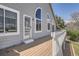 Charming home exterior featuring a spacious deck with railing at 1737 Jules Ct, Highlands Ranch, CO 80126