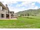 Spacious backyard and mountain views add to the appeal of this stunning property at 5881 Deer Meadow Trl, Golden, CO 80403