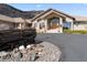 Beautiful exterior view of home, complemented by a circular drive and professional landscaping at 5881 Deer Meadow Trl, Golden, CO 80403