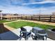Inviting backyard patio with comfortable seating and a beautifully landscaped yard at 8981 Bellsong Circle Cir, Littleton, CO 80125