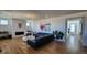 Bright living room featuring a modern fireplace, sleek furniture, and plenty of natural light at 8981 Bellsong Circle Cir, Littleton, CO 80125