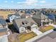 A peaceful aerial view of a house nestled in a serene suburban neighborhood at 14160 Ivanhoe St, Thornton, CO 80602