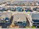 A tranquil aerial view captures a home backing onto a community green space at 14160 Ivanhoe St, Thornton, CO 80602