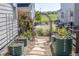 Backyard showing a vegetable garden with lush greenery and garden bed boxes at 14160 Ivanhoe St, Thornton, CO 80602