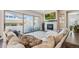 Comfortable living room with a cozy fireplace and a large sliding glass door that provides lots of natural light at 14160 Ivanhoe St, Thornton, CO 80602