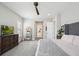 Large, bright main bedroom features an ensuite bathroom and a walk-in closet at 14160 Ivanhoe St, Thornton, CO 80602
