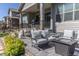 Back patio has a lounge set, artificial turf, and is great for outdoor relaxation at 14160 Ivanhoe St, Thornton, CO 80602