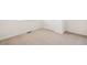 Bedroom with neutral carpet, white trim, and a door that enhances the room's style and functionality at 27674 E Byers Ave, Aurora, CO 80018