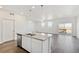 Spacious kitchen with granite countertops, stainless appliances and lots of natural light at 27674 E Byers Ave, Aurora, CO 80018