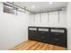 Finished basement with gray cabinet storage and closet organization for storage at 6742 Marshall St, Arvada, CO 80003