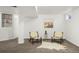 Basement living room area with a decorative rug, wall art and recessed lighting at 6742 Marshall St, Arvada, CO 80003