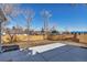 Spacious backyard featuring a new patio and wood fence, great for outdoor living at 10025 W 8Th Ave, Lakewood, CO 80215